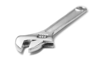 chave inglesa ajustável isolada em branco foto