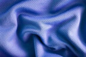fundo de textura de tecido de roupas esportivas, vista superior da superfície têxtil de pano foto