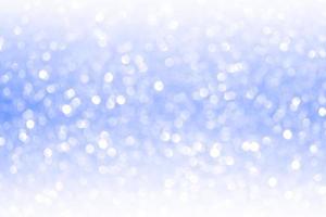 confete de brilho de prata e brilho branco desfocado abstrato com reflexo de luz gradiente para uso de fundo foto
