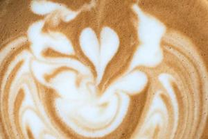 closeup da arte na superfície do café com leite. foto