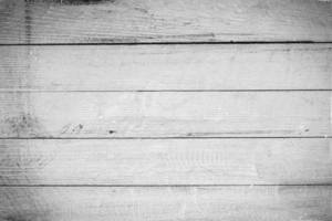 textura de fundo de madeira branca vintage com nós e furos de prego. parede de madeira pintada velha. abstrato marrom. placas horizontais escuras de madeira vintage. vista frontal com espaço de cópia foto