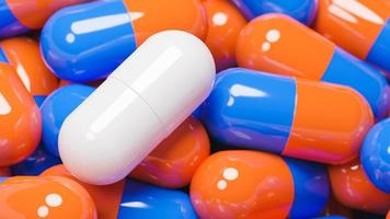 close-up da cápsula de pílula branca em muitas cápsulas de pílulas laranja e azuis. conceito de medicina e especialidades farmacêuticas., modelo 3d e ilustração. foto