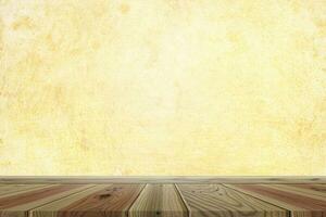 vazio de piso de madeira sobre fundo de cor pastel amarelo claro. para a exibição ou design do seu produto. foto