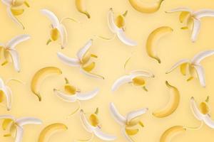 banana amarela em um fundo de papel de parede amarelo foto