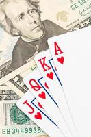 cartas de jogar poker royal flush na nota de dólar foto