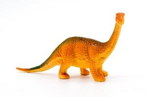 modelo de brinquedo de dinossauro braquiossauro em fundo branco foto