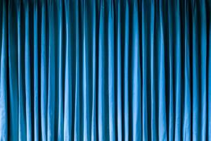 cortina azul. fundo de cortina de teatro foto