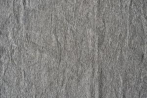 fundo de textura de linho natural. tecido amassado de cor cinza, textura áspera foto
