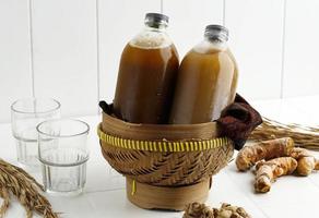 jamu gendong, bebida de ervas tradicional indonésia foto