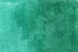 fundo verde aquarela com pinceladas, pontos, manchas foto