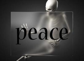 palavra de paz em vidro e esqueleto foto