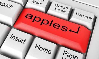 palavra de maçãs no teclado branco foto