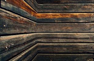 a parede de madeira do celeiro marrom. padrão de fundo de textura de parede. foto