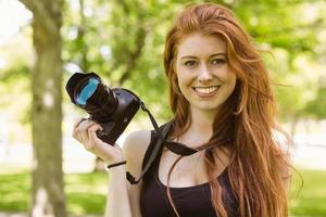 lindo fotógrafo feminino no parque foto