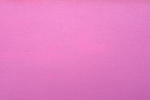 fundo de textura de parede de concreto rosa. foto