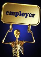palavra empregador e esqueleto dourado foto