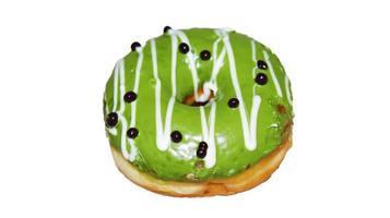 os donuts de sabor matcha, isolados no fundo branco foto