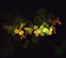 fundo de bokeh amarelo dourado há um brilho de luzes, idéias de festa de natal e ano novo. foto