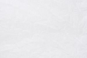 textura de papel de embrulho amassado branco close-up. foto