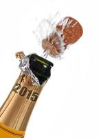 garrafa de champanhe de véspera de ano novo 2015 foto