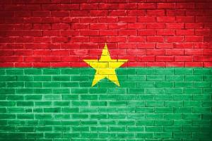 fundo de textura de parede de bandeira de burkina faso foto