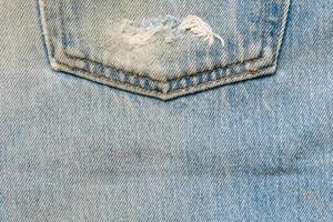 o jeans azul ou textura limpa denim azul. foto
