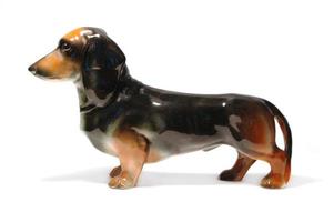 perro dachshund de cerâmica foto