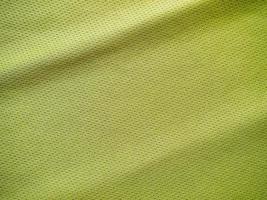 textura de jersey de tecido de roupas esportivas verdes foto