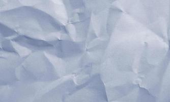 fundo de textura de papel amassado colorido azul marinho para design, decorativo. foto