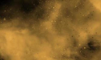 fumaça de cor dourada polida em fundo preto foto