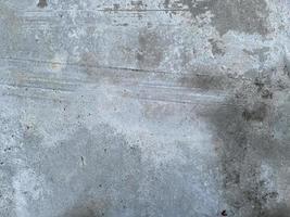 fundo de parede com texturas ásperas. parede de concreto cinza para segundo plano. foto