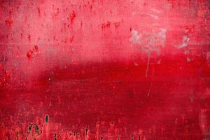 superfície de metal enferrujada pintada de vermelho áspero, textura de alta resolução foto
