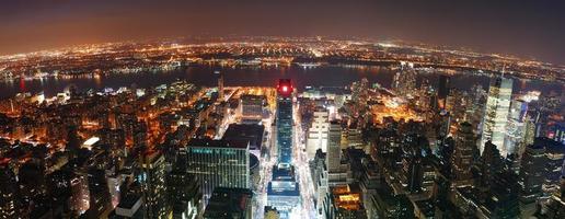 panorama de vista aérea do horizonte de manhattan cidade de nova york ao pôr do sol foto