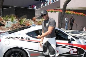 los angeles, 11 de abril - corbin bleu no dia de qualificação pro celeb race de 2014 em long beach grand prix em 11 de abril de 2014 em long beach, ca foto