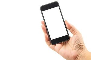 mão feminina segurando o telefone móvel inteligente de tela em branco branca foto