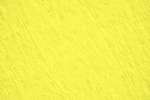 parede de ouro ou fundo de folha de ouro de folha amarela brilhante, textura de papel dourado, superfície de cimento abstrata, padrão de concreto, cimento pintado foto