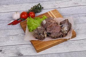 carne de porco marinada pronta para cozinhar foto