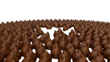 closeup de um grupo renderizado em 3d reuniu chocolates no fundo branco foto