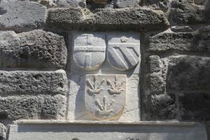 símbolos de cavaleiro no castelo de bodrum, cidade de bodrum, turquia foto