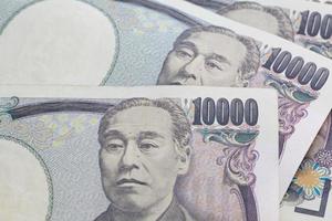 notas de iene japonês close-up para o conceito de finanças foto
