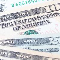 as notas de dólar para o conceito de negócios e finanças