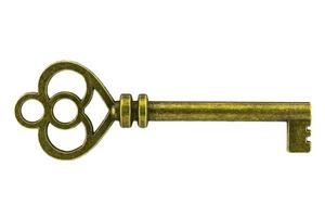 chave vintage chave dourada antiga no traçado de recorte de fundo branco foto