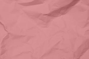 fundo de textura de papel amassado rosa rosa. fundo de textura de papel enrugado rosa rosa. fundo de textura de tecido de vinco rosa rosa. fundo de textura de tecido enrugado rosa rosa. foto