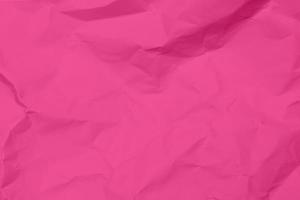 fundo de textura de papel amassado rosa. fundo de textura de papel enrugado rosa. fundo de textura de tecido de vinco rosa. fundo de textura de tecido rosa enrugado.