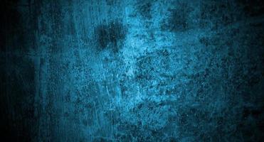 concreto azul assustador para segundo plano. conceito de fundo de halloween de parede azul escuro. textura de cimento de terror foto