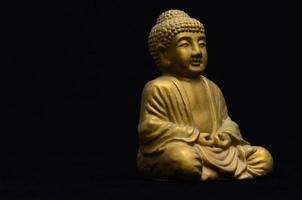 pequena imagem de Buda dourado foto