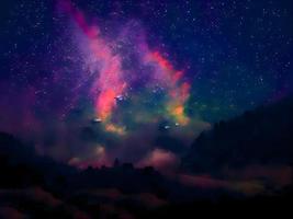 via láctea e luz rosa nas montanhas. paisagem colorida à noite. céu estrelado com colinas. lindo universo. fundo de espaço com galáxia. fundo de viagem