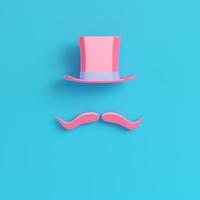 chapéu de cilindro rosa com bigode falso em fundo azul brilhante em tons pastel foto