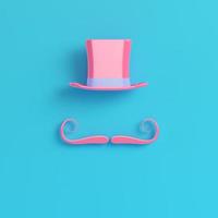 chapéu de cilindro rosa com bigode falso em fundo azul brilhante em tons pastel foto