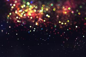bokeh glitter colorido fundo abstrato borrado para aniversário, aniversário, casamento, véspera de ano novo ou natal foto
